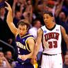 UNI guard Ali Farokhmanesh signals his game winning three-point shot as he pushes his way past UNLV guard Tre'Von Willis during their first round NCAA Basketball Tournament game Thursday, March 18, 2010 at the Ford Center in Oklahoma Ctiy. UNI won the game 69-66 on a last second three-point shot.