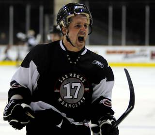 Las Vegas Wranglers forward Alex Bourret celebrates scoring a goal against Alaska earlier this season. The Wranglers host Utah Tuesday in the first round of the ECHL playoffs.