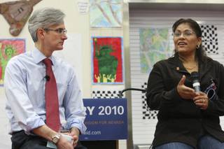 Gubernatorial candidate Rory Reid listens as Lisa Plyman, parent volunteer coordinator at Walter Bracken Elementary, speaks about the importance of education during a panel discussion on Reid's plan for transforming Nevada's education system Monday, March 22, at Walter Bracken Elementary School.