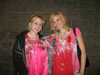 Two patrons of Las Vegas Prom Closet Store 2009 show off their new dresses. Last year, the group gave about 350 dresses to teenage girls in Clark County.