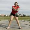UNLV track and field thrower Amanda Bingson swings through the first rotation of her throw during practice Tuesday. Bingson, a sophomore, recently set a new UNLV hammer throw record of 183 feet, 4 inches. UNLV track and field thrower Amanda Bingson swings through the first rotation of her throw during practice Tuesday. Bingson, a sophomore, recently set a new UNLV hammer throw record of 183 feet, 4 inches.