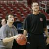 UNLV guard Kevin Kruger shoots while his father, Rebels coach Lon Kruger, looks on as the team prepared for its Sweet Sixteen contest against Oregon in St. Louis on March 22, 2007. UNLV guard Kevin Kruger shoots while his father, Rebels coach Lon Kruger, looks on as the team prepared for its Sweet Sixteen contest against Oregon in St. Louis on March 22, 2007.