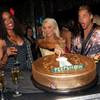 Holly Madison, right, and the cast of Peepshow celebrate the show's first anniversary with a signature Peepshow cake at the Chi Theater inside Planet Hollywood on April 18, 2010. 