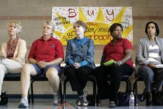 Members of the Clark County Education Association's negotiation committee sit at the front of the cafeteria Tuesday during a CCEA bargaining update meeting at Del Sol High School.