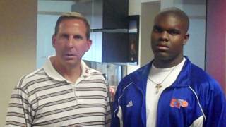 Bishop Gorman High junior football player Jalen Grimble, right, poses for a photo with Nebraska coach Bo Pelini last weekend during an unofficial recruiting trip.
