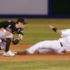 Sacramento River Cats second baseman Eric Sogard looses the ball as the Las Vegas 51's Jeremy Reed steals second Saturday, April 24, 2010.