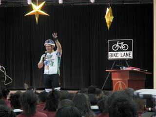 Regional Transportation Commission General Manager Jacob Snow speaks to students at Agassi College Preparatory Academy about the importance of wearing helmets while riding bicycles.