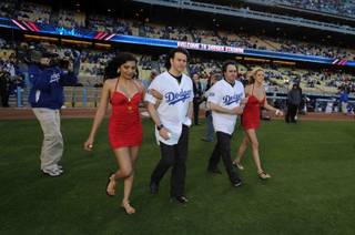 Kerry Simon and George Maloof at the Los Angeles Dodgers and Pittsburgh Pirates game at Dodger Stadium on April 29, 2010.