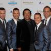 Smokey Robinson is flanked by Human Nature at the Imperial Palace on May 11, 2010.