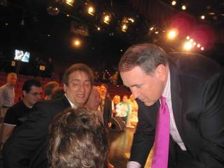Mike Huckabee greets audience members during the filming of Fox News' Huckabee at The Venetian on May 20, 2010.