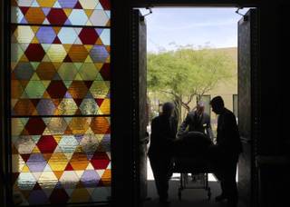 Palm Mortuary funeral attendants bring the casket of Barbara Greenspun, publisher of the Las Vegas Sun, into Congregation Ner Tamid for a funeral service in Henderson on Thursday. 