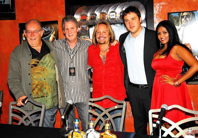 Robin Leach, Ken Ciancimino, Vince Neil, Ben Greenberg and Reisha Roopchand at the grand opening of Vince Neil's Tres Rios in the Las Vegas Hilton on June 12, 2010.