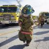 Photo: Rookie Clark County firefighters pull hoses as par Photo: Rookie Clark County firefighters pull hoses as par