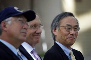 Secretary of Interior Ken Salazar, left, Senate Majority Leader Harry Reid (D-Nev.), center, and Secretary of Energy Steven Chu wait to announce a Nevada Test Site solar power development zone during a news conference at UNLV's Greenspun Hall Thursday, July 8, 2010.