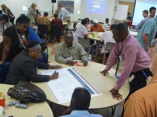 Small groups discussed the F Street connection project at the design workshop Tuesday.