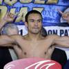 WBA/WBO lightweight champion Juan Manuel Marquez of Mexico City poses on the scale during an official weigh-in at the Mandalay Bay Events Center Friday, July 30, 2010. Marquez takes on Juan Diaz of Houston, Texas for a rematch at the events center on Saturday.