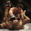 Chael Sonnen, top, punches Anderson Silva during a middleweight championship fight at UFC 117 on Aug. 7, 2010, in Oakland, Calif. Silva won by submission in the fifth round to retain the championship.