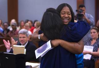 Kimberly Landrum gets a hug from Las Vegas Municipal Court Judge Cynthia Leung as she graduates from WIN (Women in Need), a city of Las Vegas specialty court, Tuesday at the Regional Justice Center. Landrum has a criminal history that began in 2000, with charges ranging from embezzlement to drugs, credit card fraud and prostitution. Today, she has successfully completed her recovery programs, is employed and is an inspiration to other program participants.