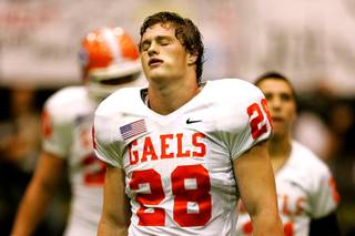 Bishop Gorman linebacker Quinn Zeger reacts at the end of Saturday's game against Hamilton High of Chandler, Ariz., at Northern Arizona University in Flagstaff in the Sollenberger Classic. Hamilton won the game in the closing minutes 24-17.