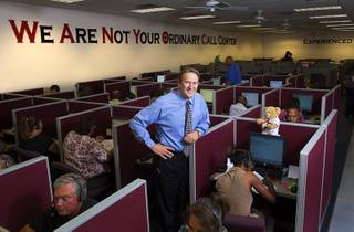 Jim Medick, president of Precision Opinion, poses in his research and polling office on Aug. 26, 2010. He recently hired more than 100 new employees.