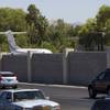 The tail of a jet plane can be seen Tuesday over a wall on the property of entertainer Wayne Newton. Newton, who lives at Pecos and Sunset roads, may create an attraction on the property that could include a museum and a theater where he'll perform after people complete a tour. The tail of a jet plane can be seen Tuesday over a wall on the property of entertainer Wayne Newton. Newton, who lives at Pecos and Sunset roads, may create an attraction on the property that could include a museum and a theater where he'll perform after people complete a tour.