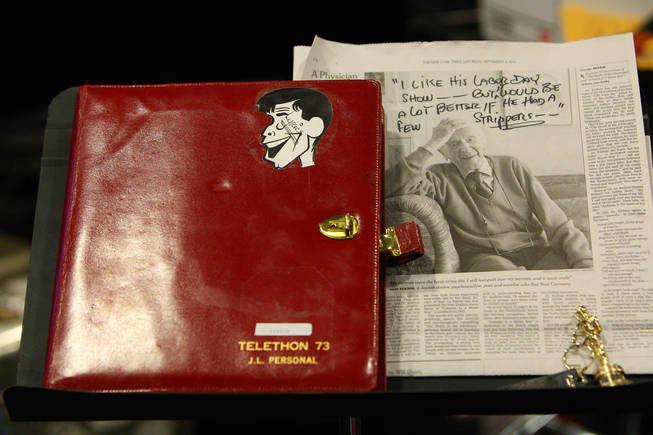 Jerry Lewis' lyrics book and an article he found funny is shown on his music stand during rehearsal for the 45th Annual Jerry Lewis MDA Labor Day Telethon Sunday night at the South Point. This year's telethon hopes to raise $70 million to surpass 2009's earnings of $60 million in the fight against muscular dystrophy.