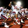 Photo: Liberty football players perform a haka after Thur Photo: Liberty football players perform a haka after Thur