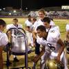 Photo: Foothill High School players take turns ringing th Photo: Foothill High School players take turns ringing th