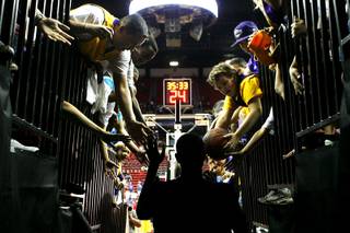 Los Angeles Lakers fans greet a player before their preseason game against the Sacramento Kings at the Thomas & Mack Center Wednesday, 13, 2010. The Lakers won the game 98-85.