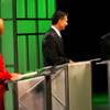 Photo: Moderator Mitch Fox, center, is joined by Senate c