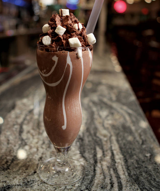 This ain't no sissy milkshake, pardner. Burger Bar's adult milkshakes come just as advertised - all the sweetness of the classic drink with a shot of liquor to kick-start the tastebuds. The Chocolate Cowboy is chocolate ice cream, chocolate whipped cream mixed together with a shot of good ol' American whiskey. Two shots is too much, Burney says (more than one and it gets too soupy), but we say there's nothing wrong with one in the drink and one on the side. It's how John Wayne would've wanted it.