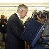 Photo: Senate Majority Leader Harry Reid votes at an earl Photo: Senate Majority Leader Harry Reid votes at an earl