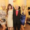 Holly Madison, Claire Sinclair, Hugh Hefner and Crystal Harris backstage at Crazy Horse Paris at MGM Grand on Oct. 21, 2010.