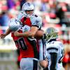 Photo: Las Vegas Locos tackle Jason Capizzi lifts up kick