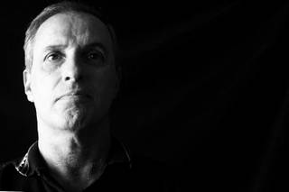 Ron Serino, a retired Army Captain with a Master's degree in hospital administration, still suffers from a bedsore he acquired in April 2010 at a local hospital. Serino was photographed inside his Las Vegas home October 26, 2010.