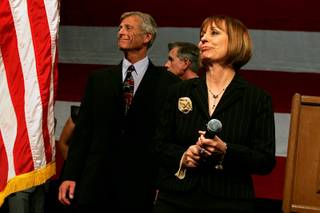 Sharron Angle arrives with her husband, Ted, to give her concession speech at the Republicans' election-night party early Wednesday at the Venetian.