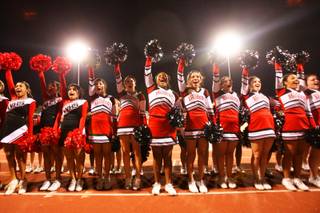 The Las Vegas cheerleaders perform for the fans during the game where their team took on Del Sol Friday during the first round of the playoffs.  Las Vegas advances with a 37-10 victory.