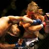 Photo: Urijah Faber and Takeya Mizugaki trade blows durin