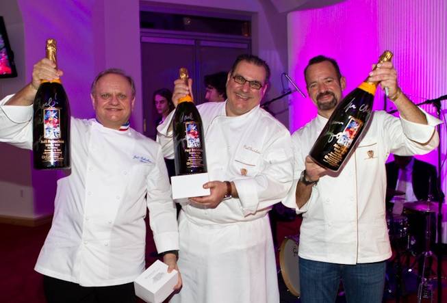 The unveiling of James Rosenquist's painting <em>Cervello Spazio Cosmico (Brain Space)</em> at Cleveland Clinic Lou Ruvo Center for Brain Health on Nov. 20, 2010. Chefs Joel Robuchon, Palul Bartolotta and Alex Stratta hold their magnums.