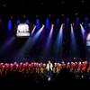 Barry Manilow is joined onstage by choirs. Barry Manilow is joined onstage by choirs.