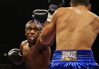 WBC welterweight champion Andre Berto, left, of the U.S. punches at Freddy Hernandez of Mexico City at the MGM Grand Garden Arena in Las Vegas, Nevada, Saturday, November 27, 2010.