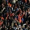 Photo: Bishop Gorman fans cheer a touchdown against Palo 