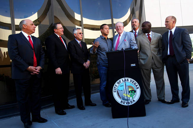 Zappos CEO Tony Hsieh, Las Vegas Mayor Oscar Goodman and members of the Las Vegas City Council answer questions in November 2010 at the Las Vegas City Council meeting, when it was officially announced the existing City Hall building would be used as the corporate headquarters for online retailer Zappos.com.