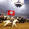 Contestants are introduced at the start of the first go round of the National Finals Rodeo Thursday, December 2, 2010 at the Thomas & Mack.