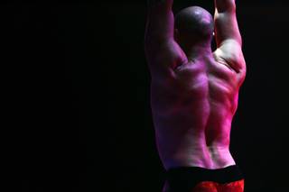 Nikolai Melnikov performs a hand-balancing act in 