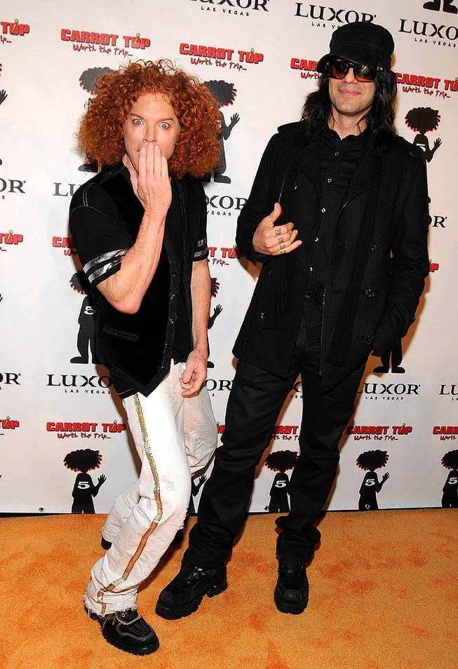 Carrot Top, with fellow Luxor headliner Criss Angel, celebrates his fifth anniversary at the Luxor on Dec. 20, 2010.