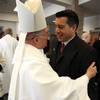 Photo: Bishop of Las Vegas Joseph A. Pepe hugs Brian Sand Photo: Bishop of Las Vegas Joseph A. Pepe hugs Brian Sand
