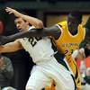 Wyoming's Djibril, right, and Colorado State's Dorian Green battle for the ball during college basketball action in Fort Collins, Colo. Jan 4, 2010. Colorado State won the game 73-60. Wyoming's Djibril, right, and Colorado State's Dorian Green battle for the ball during college basketball action in Fort Collins, Colo. Jan 4, 2010. Colorado State won the game 73-60.