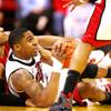 Photo: UNLV guard Oscar Bellfield looks to pass off a loo Photo: UNLV guard Oscar Bellfield looks to pass off a loo