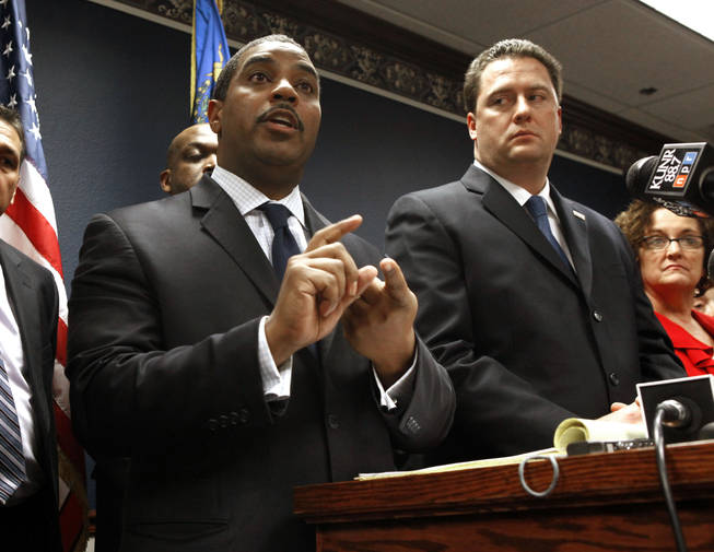 Nevada Senate Majority Leader Steven Horsford, D-North Las Vegas, left, discuses his opposition to Gov. Brian Sandoval's proposed state budget cuts during a news conference after Sandoval's State of the State address before a joint session of the Nevada Legislature in Carson City on Monday Jan. 24, 2011. At right is Assembly Speaker-elect John Oceguera, D-Las Vegas.